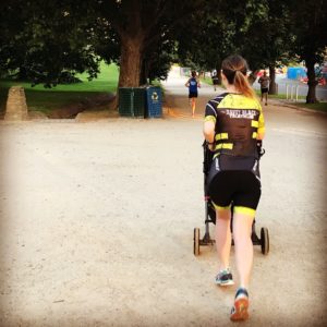 Davey Black Irish Athlete and mum Ailbhe Burke running with her baby in the pram